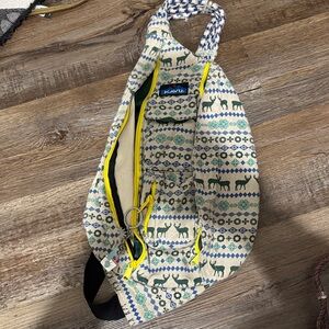 Kavu Geometric Print Sling Bag with Blue and Green Accents